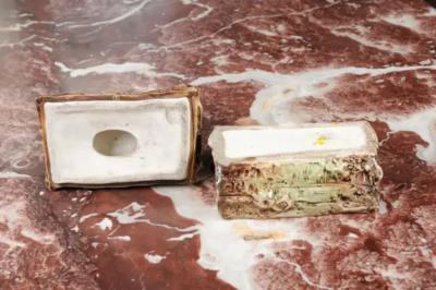 French 19th Century Barbotine Bonbon Box Depicting a Boy Laying on a Tree Trunk