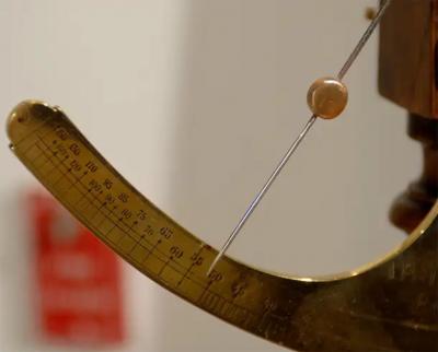 French 19th Century Brass Fabric Scale on Wooden Base by the Maison Piat