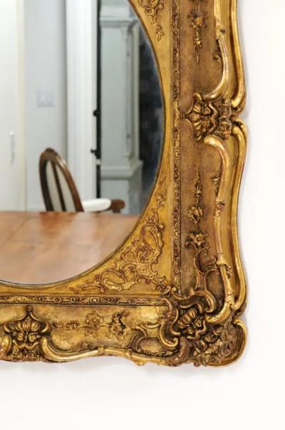 French 19th Century Carved Giltwood Mirror with Scrolling Foliage and Flowers