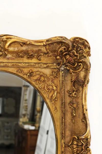 French 19th Century Carved Giltwood Mirror with Scrolling Foliage and Flowers