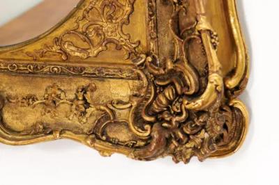 French 19th Century Carved Giltwood Mirror with Scrolling Foliage and Flowers