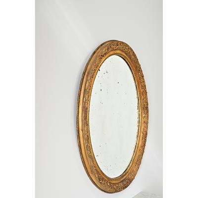 French 19th Century Massive Oval Gilt Mirror