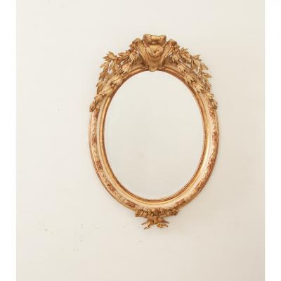 French 19th Century Painted Gilt Oval Mirror