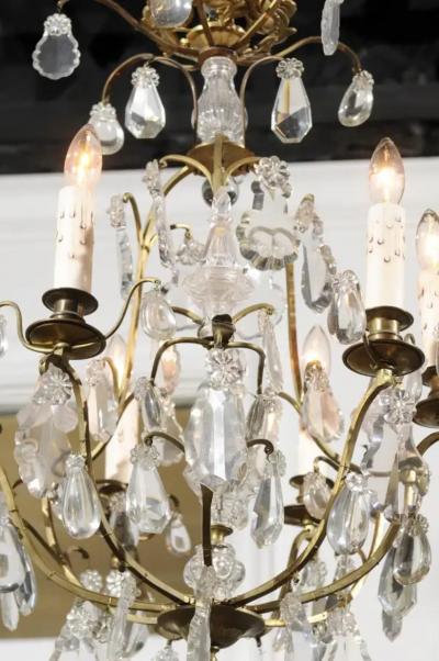French 19th Century Six Light Crystal Chandelier with Scrolled Brass Armature
