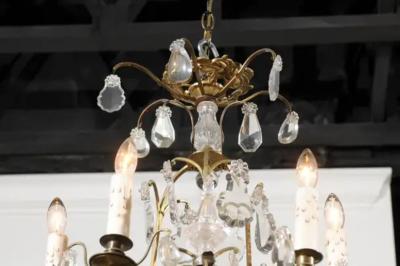 French 19th Century Six Light Crystal Chandelier with Scrolled Brass Armature