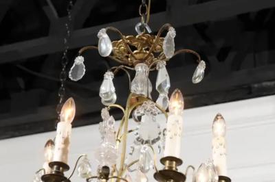 French 19th Century Six Light Crystal Chandelier with Scrolled Brass Armature