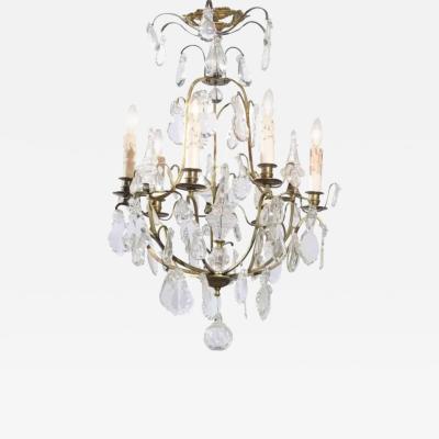 French 19th Century Six Light Crystal Chandelier with Scrolled Brass Armature