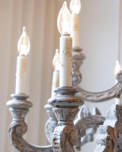 French 20th Century Carved and Painted Wood Twelve Light Chandelier
