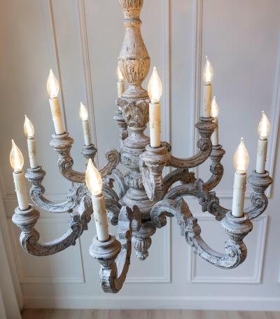 French 20th Century Carved and Painted Wood Twelve Light Chandelier