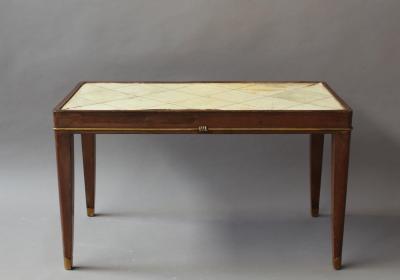 French Art Deco Rosewood Coffee Table with a Parchment Top and Bronze Details