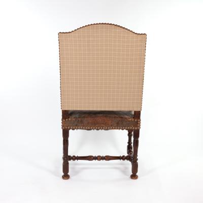 French Baroque Style Walnut Fauteuil Upholstered In Embossed Leather Circa 1800