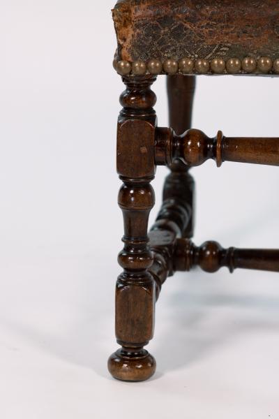 French Baroque Style Walnut Fauteuil Upholstered In Embossed Leather Circa 1800