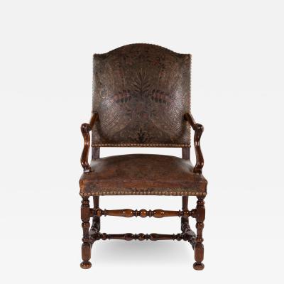 French Baroque Style Walnut Fauteuil Upholstered In Embossed Leather Circa 1800