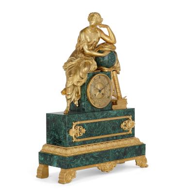 French Charles X malachite and gilt bronze figurative clock