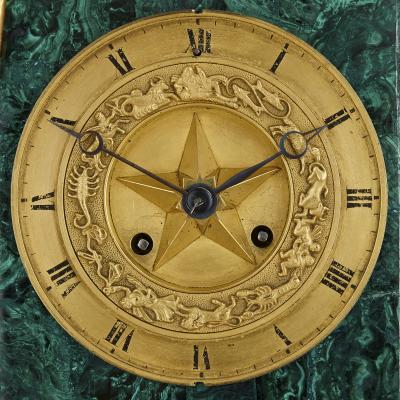 French Charles X malachite and gilt bronze figurative clock