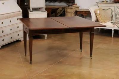 French Directoire Style 19th Century Walnut Table with Folding Top Tapered Legs
