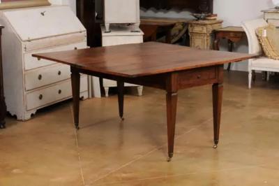 French Directoire Style 19th Century Walnut Table with Folding Top Tapered Legs