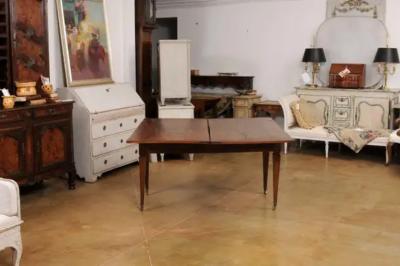 French Directoire Style 19th Century Walnut Table with Folding Top Tapered Legs