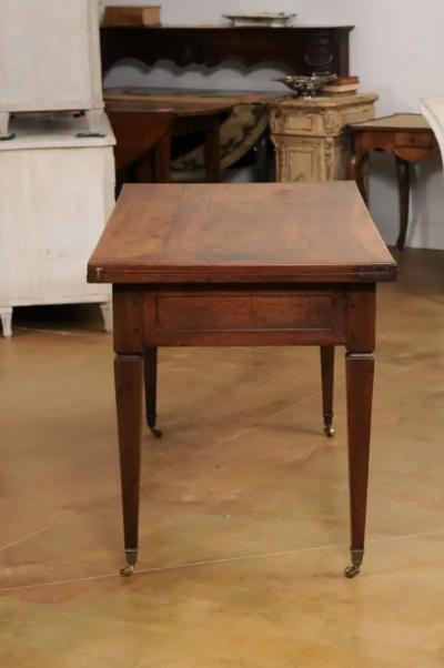 French Directoire Style 19th Century Walnut Table with Folding Top Tapered Legs