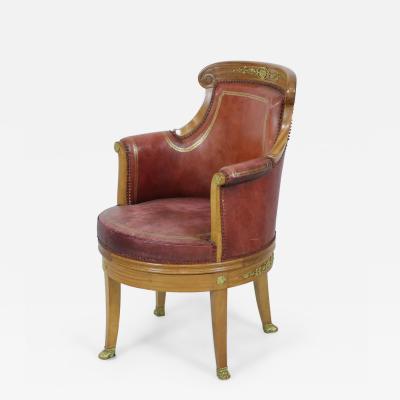 French Empire Blond Mahogany Swivel Leather Chair With Bronze Trim