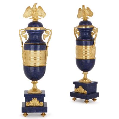 French Empire style lapis and gilt bronze three piece clock set