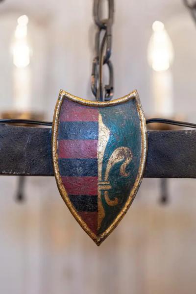 French Gothic Style Eight Light Iron Chandelier with Hand Painted Crests Wired