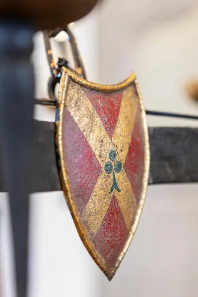 French Gothic Style Eight Light Iron Chandelier with Hand Painted Crests Wired