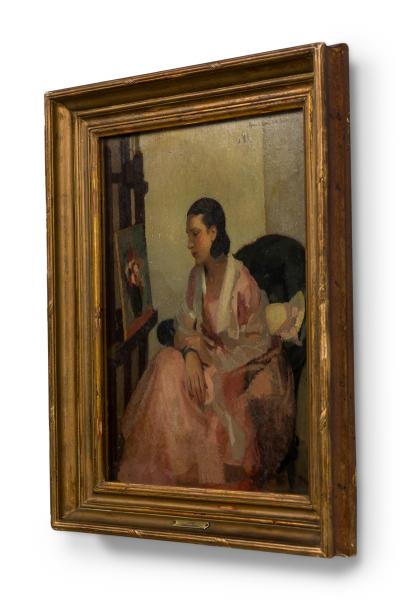 French Impressionist portrait of a young lady studying a still life painting by