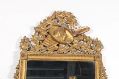 French Late 18th Century Louis XVI Period Giltwood Mirror with Carved Crest