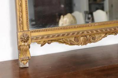 French Late 18th Century Louis XVI Period Giltwood Mirror with Carved Crest