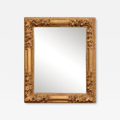 French Late 18th Century R gence Style Carved Mirror with Floral Decor