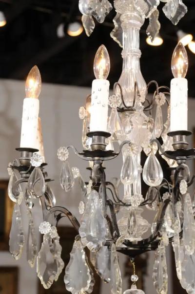 French Late 19th Century Eight Arm Crystal Chandelier with Dark Metal Armature