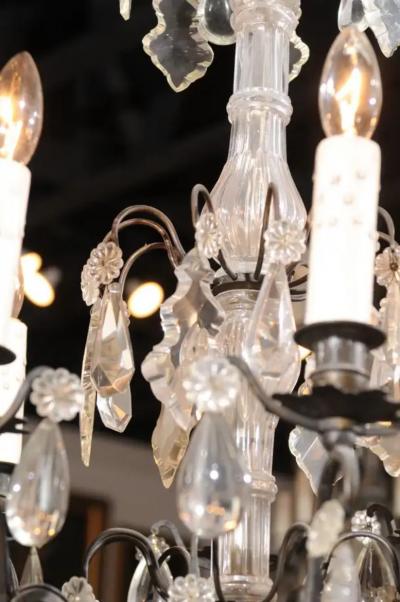 French Late 19th Century Eight Arm Crystal Chandelier with Dark Metal Armature
