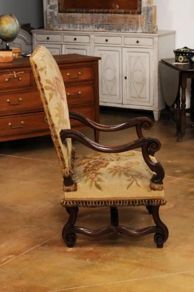 French Louis XIV Style Walnut Fauteuil with Carved Arms and Scrolling Legs