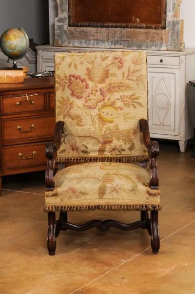 French Louis XIV Style Walnut Fauteuil with Carved Arms and Scrolling Legs