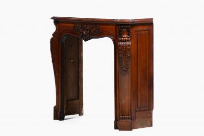 French Louis XV Rococo Walnut Mantel with Hand Carved Floral Reliefs C 1750