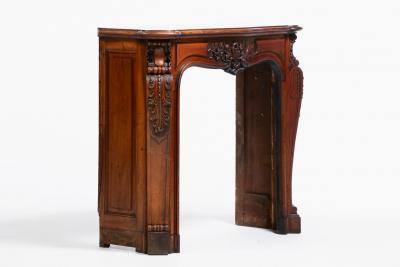 French Louis XV Rococo Walnut Mantel with Hand Carved Floral Reliefs C 1750