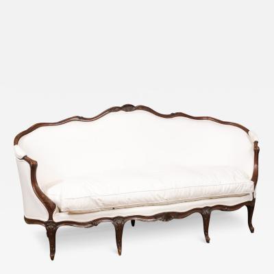 French Louis XV Style Walnut Upholstered Canap with Wraparound Back circa 1850
