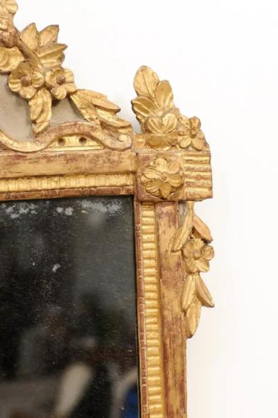 French Louis XVI 18th Century Giltwood Mirror with Carved Bouquet of Flowers