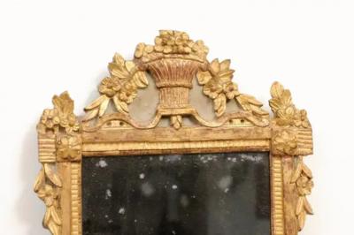 French Louis XVI 18th Century Giltwood Mirror with Carved Bouquet of Flowers