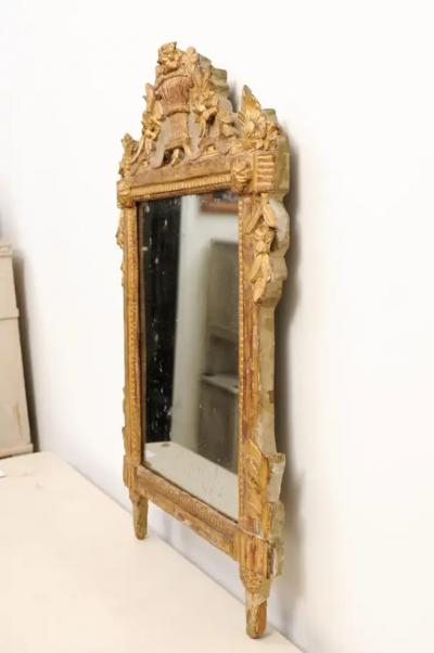 French Louis XVI 18th Century Giltwood Mirror with Carved Bouquet of Flowers