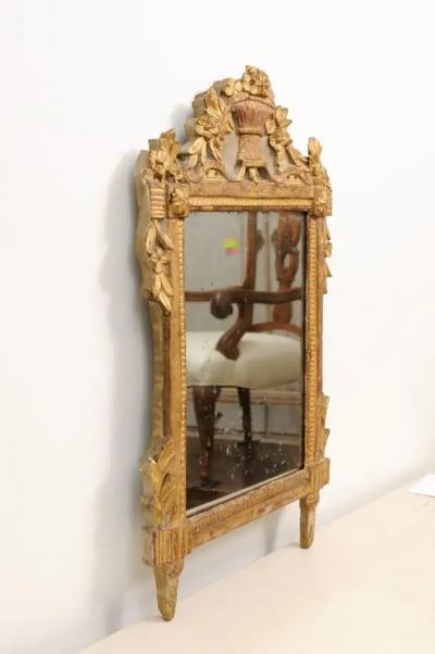 French Louis XVI 18th Century Giltwood Mirror with Carved Bouquet of Flowers