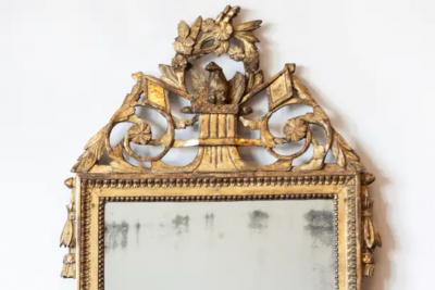French Louis XVI Period 1790s Giltwood Mirror with Carved Bird and Flags