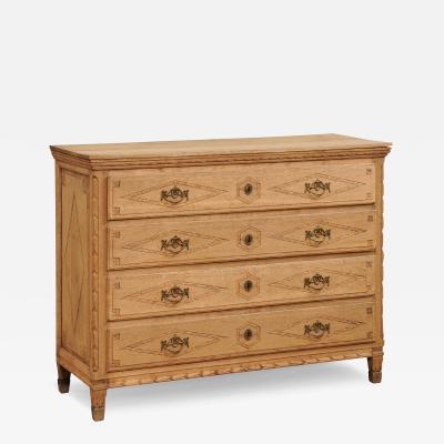 French Louis XVI Period 1790s Natural Oak Four Drawer Commode with Carved D cor