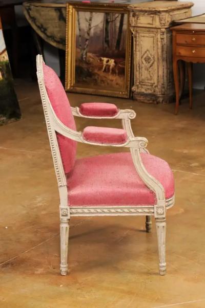French Louis XVI Style 19th Century Painted Fauteuil with Abundant Carved D cor