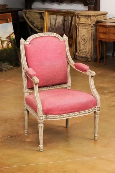 French Louis XVI Style 19th Century Painted Fauteuil with Abundant Carved D cor