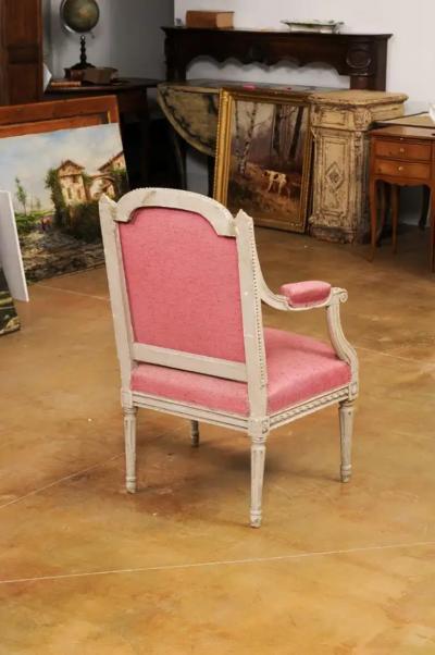 French Louis XVI Style 19th Century Painted Fauteuil with Abundant Carved D cor