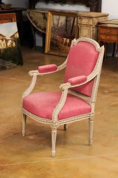 French Louis XVI Style 19th Century Painted Fauteuil with Abundant Carved D cor