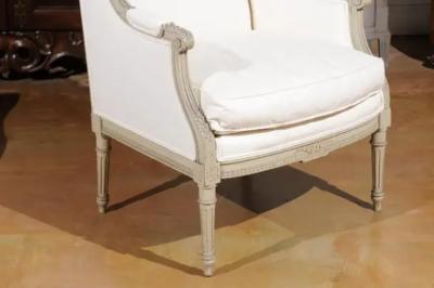 French Louis XVI Style 19th Century Painted and Carved Wingback Berg re Chair