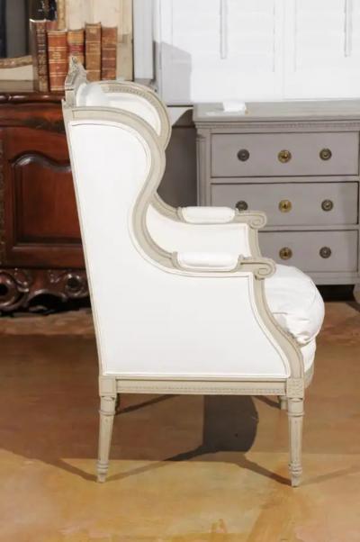 French Louis XVI Style 19th Century Painted and Carved Wingback Berg re Chair
